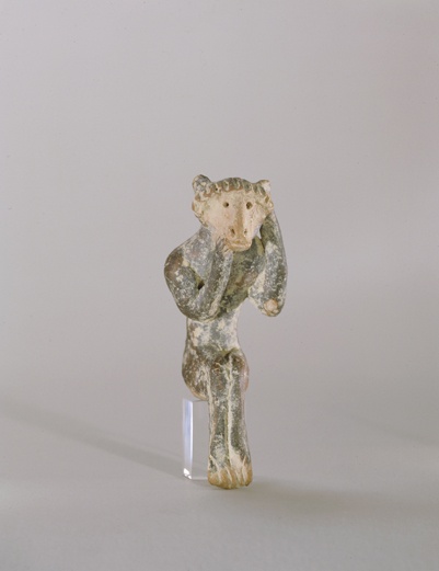 093. Seated Figure - Archaic